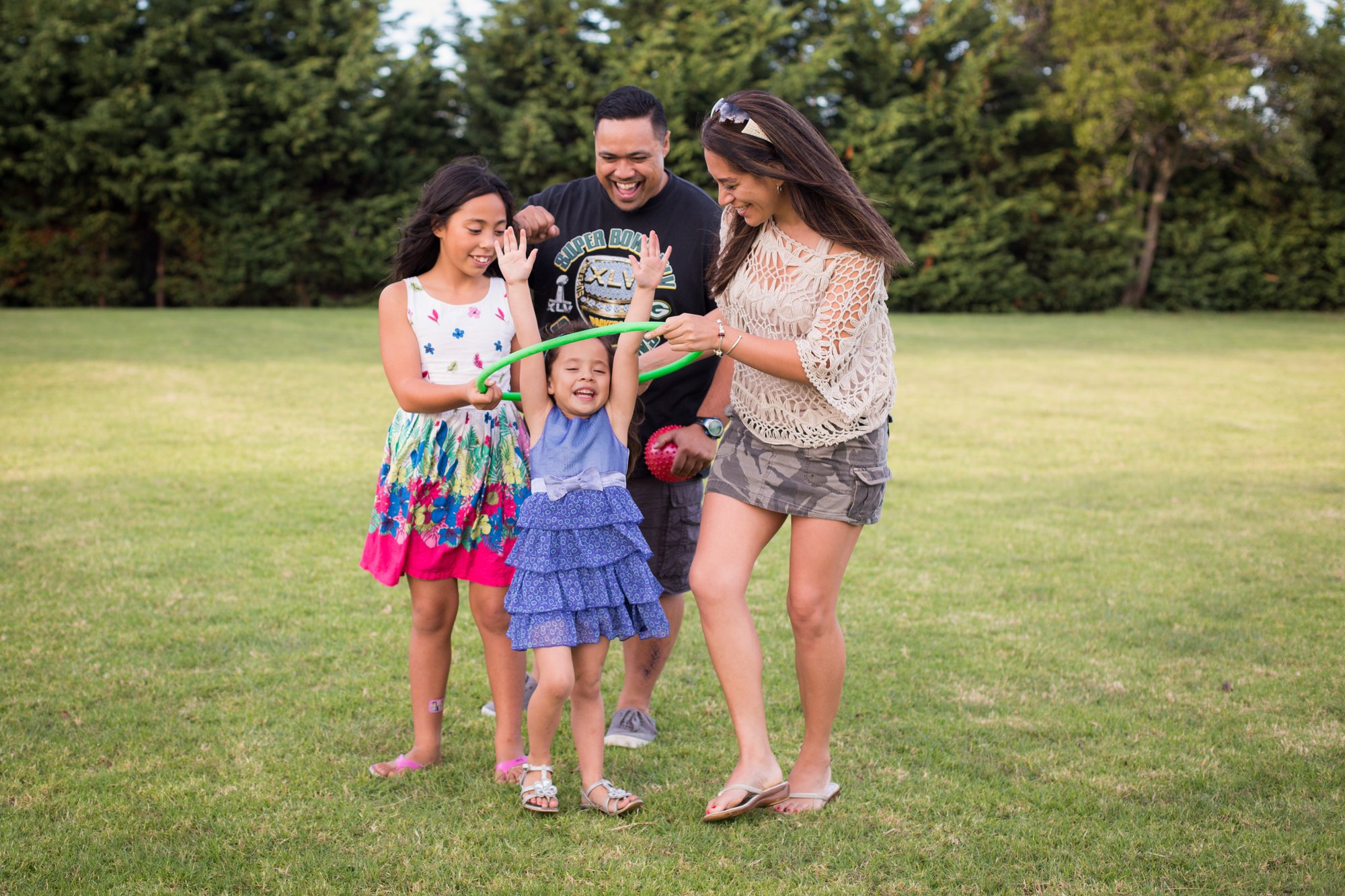 Family playing in park _043A7816